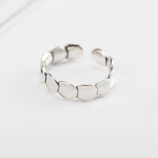 Silhouette Serenity: Petite Adjustable SIlver Ring