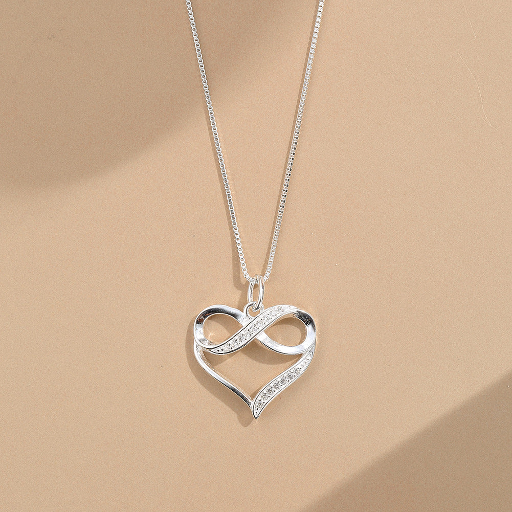 Endless Affection: Sterling Silver Heart & Infinity Clavicle Necklace with Zircon Accents