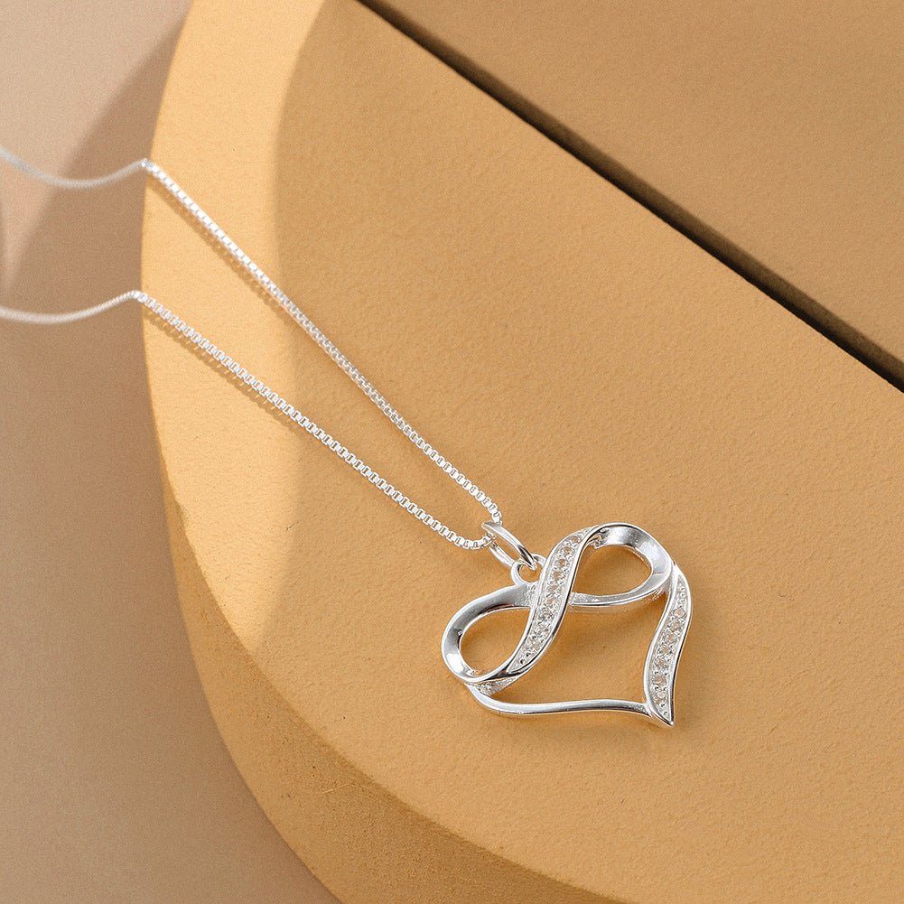 Endless Affection: Sterling Silver Heart & Infinity Clavicle Necklace with Zircon Accents