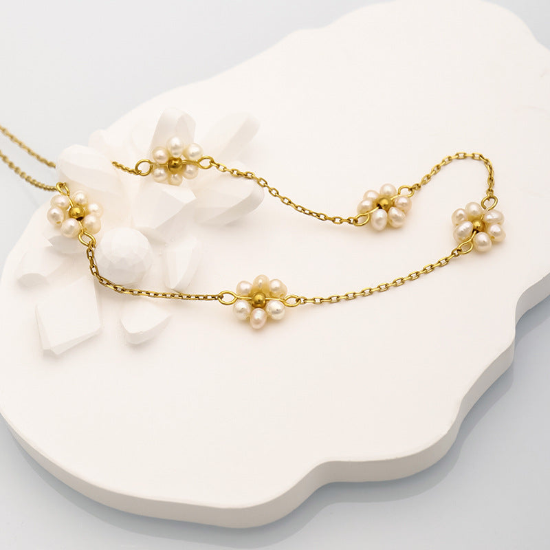 Perennial Luster: Freshwater Pearl Floral Electroplated Necklace.