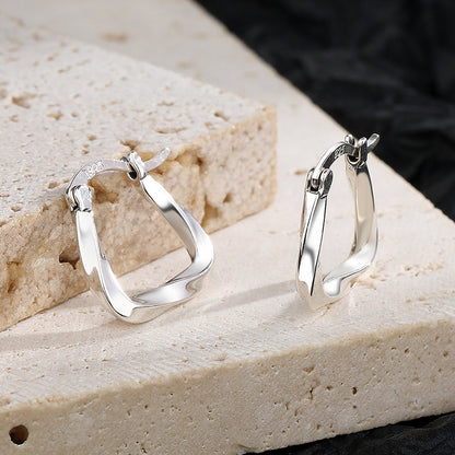 Sculptural Chic: Silver Geometric Earrings