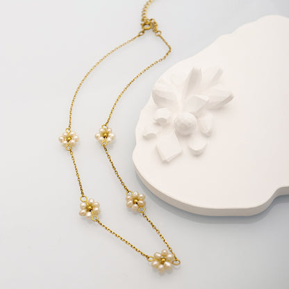 Perennial Luster: Freshwater Pearl Floral Electroplated Necklace.