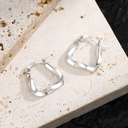 Sculptural Chic: Silver Geometric Earrings